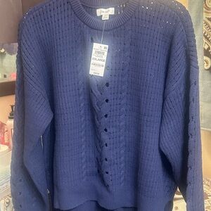 Navy Sweater for Women with loose/open weave stitching.